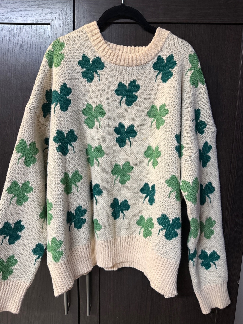 Cozy Cream Sweater with Green Clover Pattern